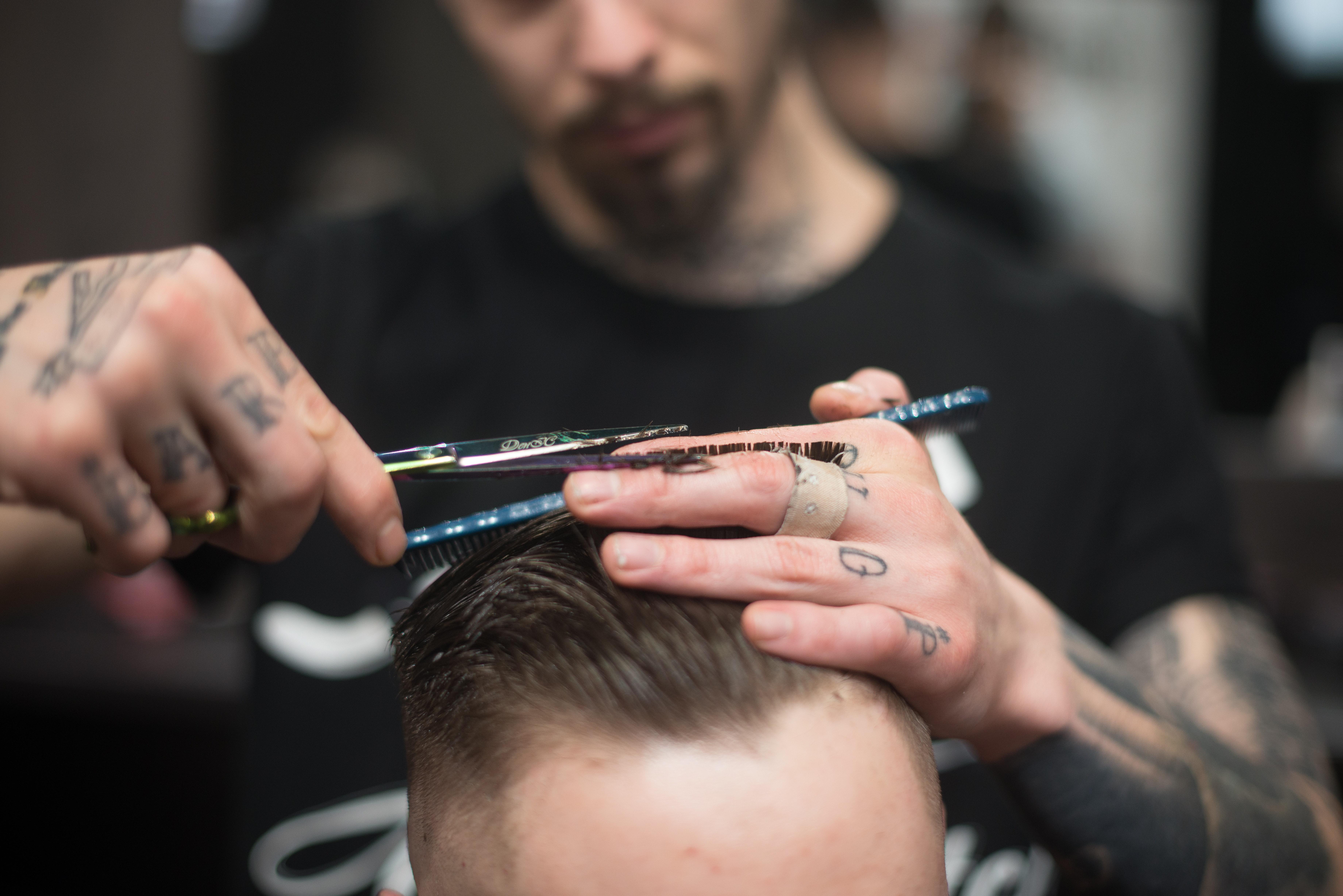 Barber Cutting Hair